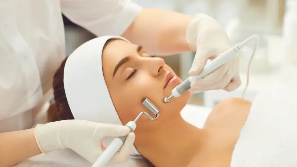 Aesthetician performing a facial treatment at 7 Seas Medical Spa in Augusta, GA